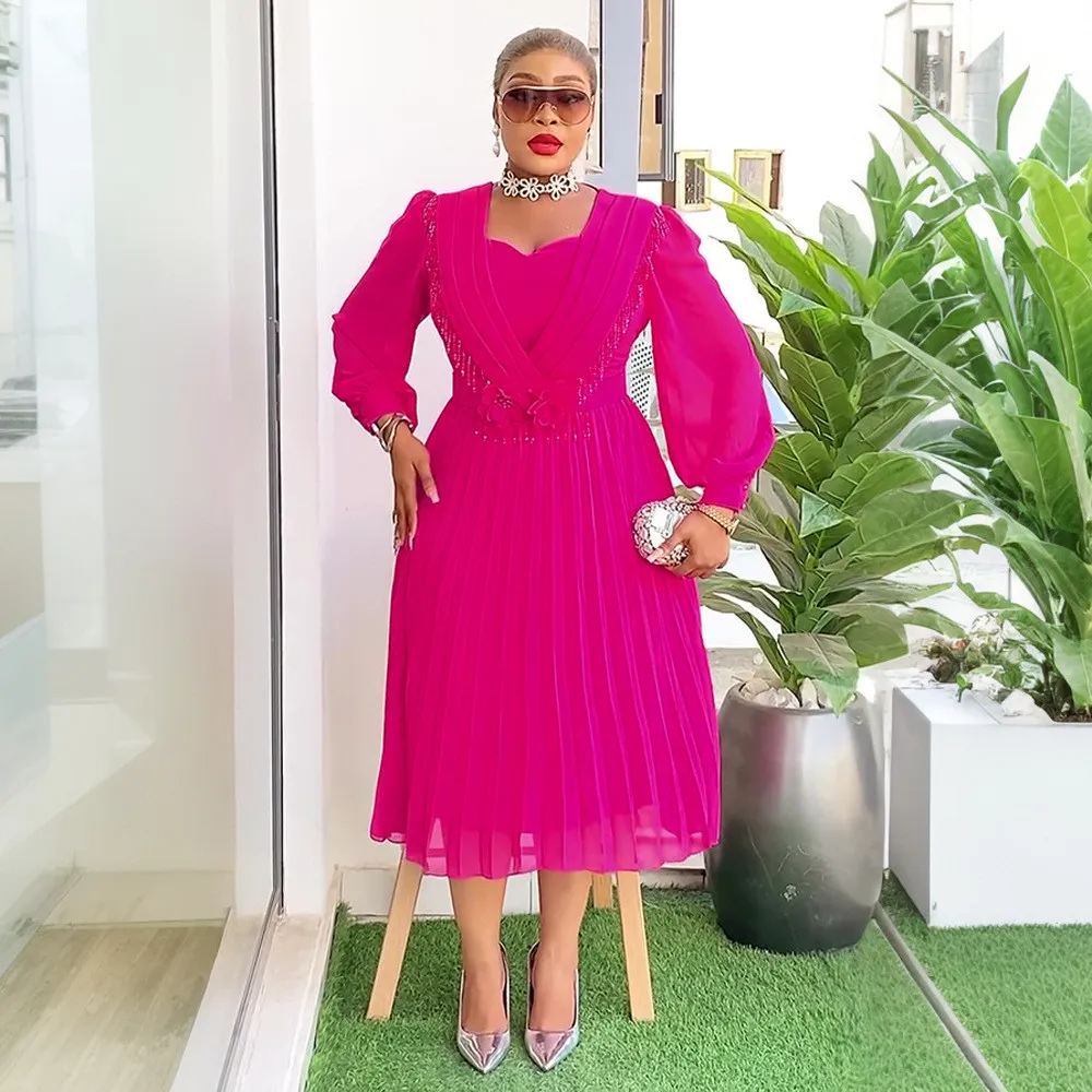 Robe trapèze plissée en mousseline de soie à taille fine et chic