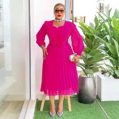 Robe trapèze plissée en mousseline de soie à taille fine et chic
