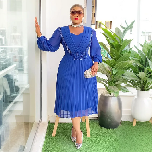 Robe trapèze plissée en mousseline de soie à taille fine et chic