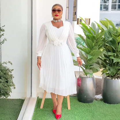 Robe trapèze plissée en mousseline de soie à taille fine et chic